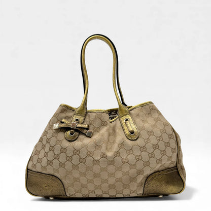 https://cdn.shopify.com/s/files/1/0564/9376/8855/files/Gucci_Shopper_Princy_monogram_beige_vintage_GG4639.webp?v=1764895539