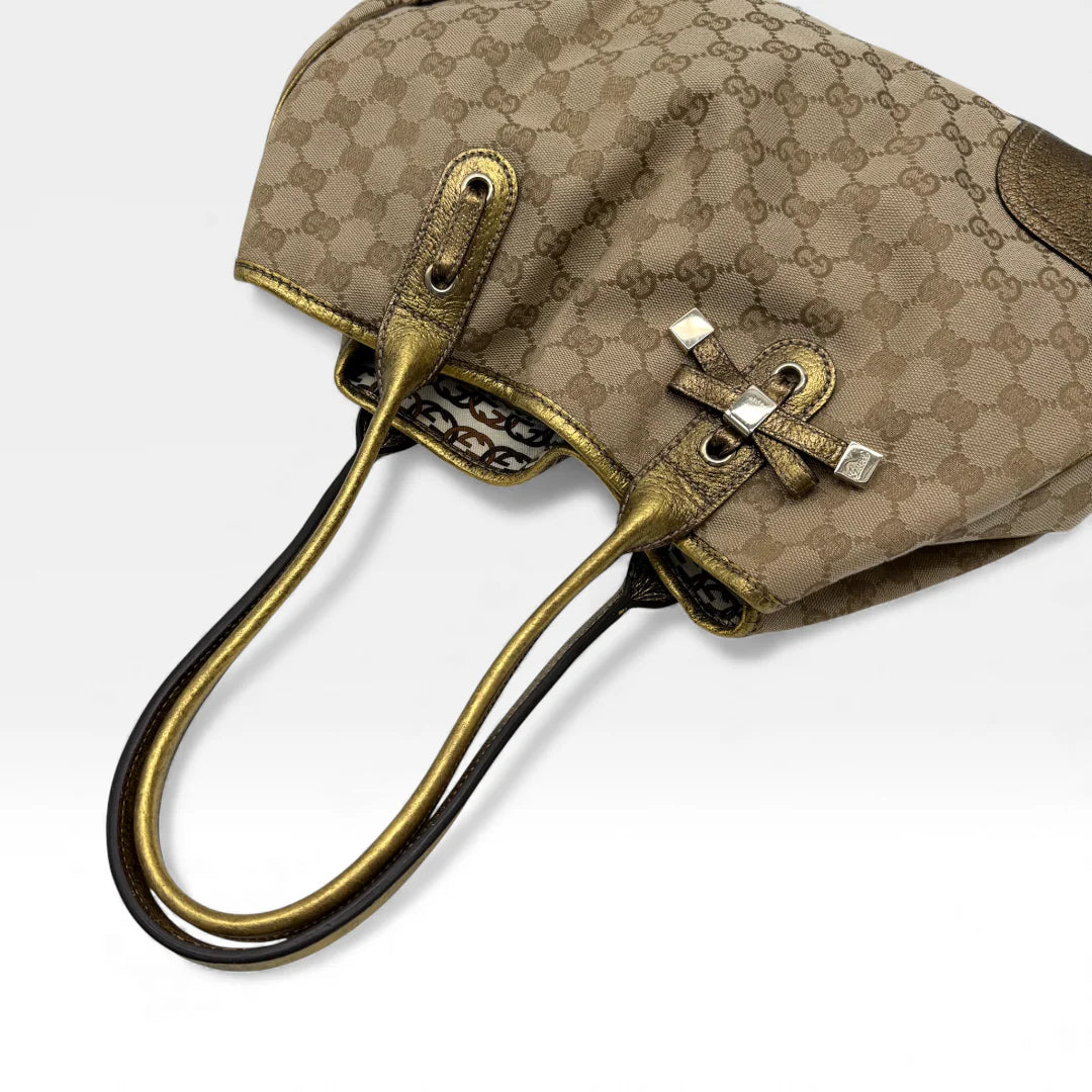 https://cdn.shopify.com/s/files/1/0564/9376/8855/files/Gucci_Shopper_Princy_monogram_beige_vintage_GG4650.webp?v=1764895599