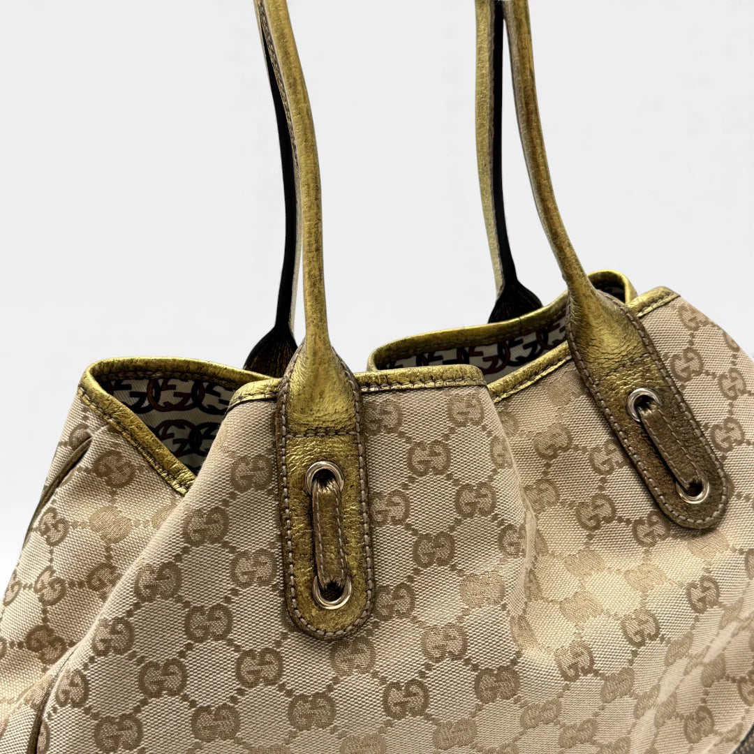 https://cdn.shopify.com/s/files/1/0564/9376/8855/files/Gucci_Shopper_Princy_monogram_beige_vintage_GG4653.webp?v=1764895599