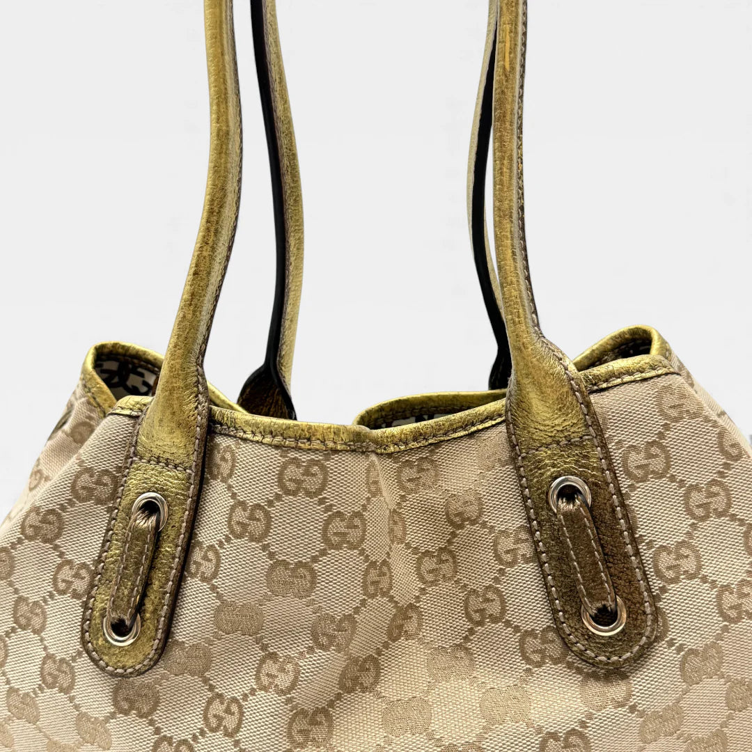 https://cdn.shopify.com/s/files/1/0564/9376/8855/files/Gucci_Shopper_Princy_monogram_beige_vintage_GG4654.webp?v=1764895599