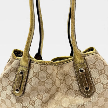 https://cdn.shopify.com/s/files/1/0564/9376/8855/files/Gucci_Shopper_Princy_monogram_beige_vintage_GG4654.webp?v=1764895599