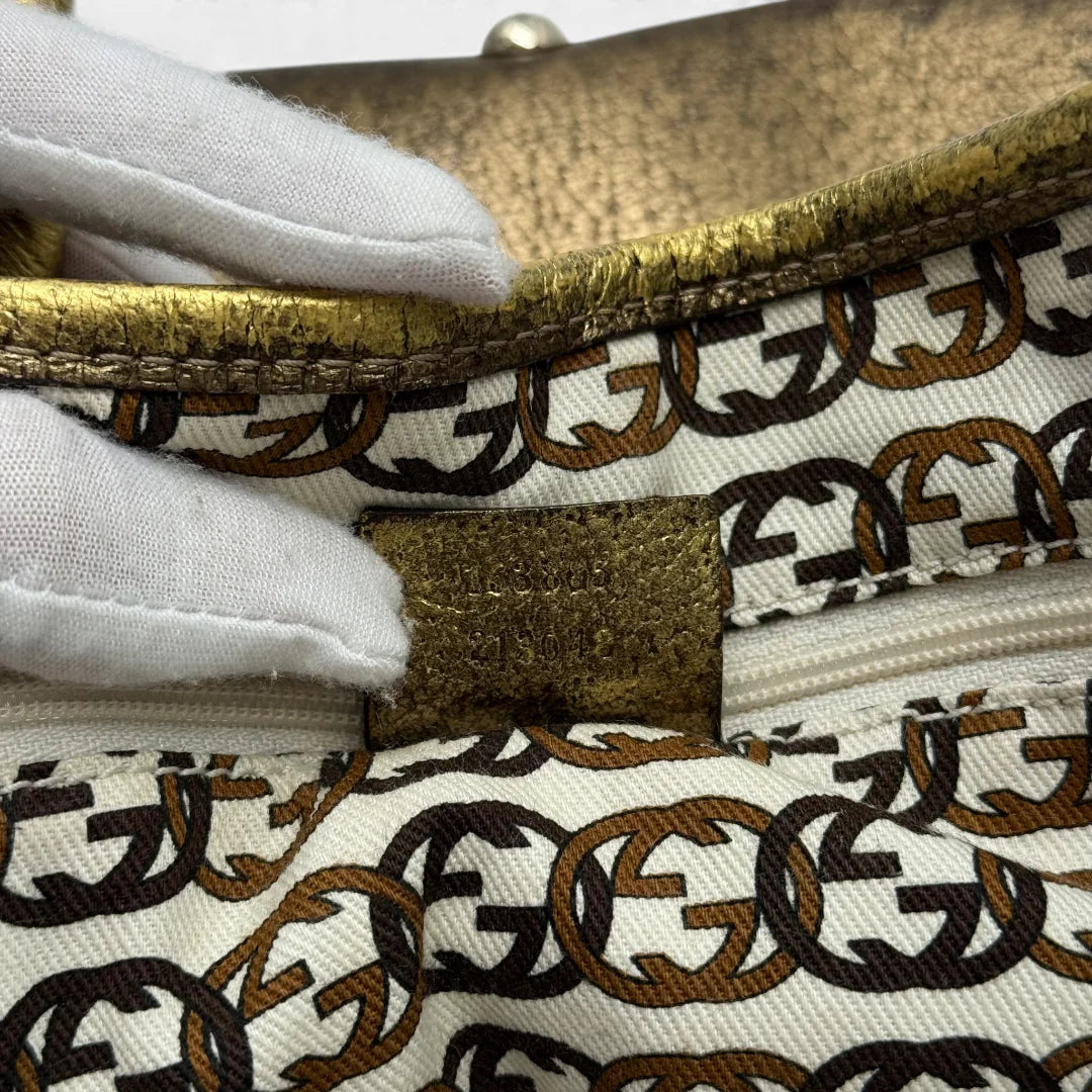 https://cdn.shopify.com/s/files/1/0564/9376/8855/files/Gucci_Shopper_Princy_monogram_beige_vintage_GG4657.webp?v=1764895599