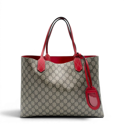 https://cdn.shopify.com/s/files/1/0564/9376/8855/files/Gucci_Shopper_Reversible_Tote_GG_Supreme_monogram_beige_1.webp?v=1781713704