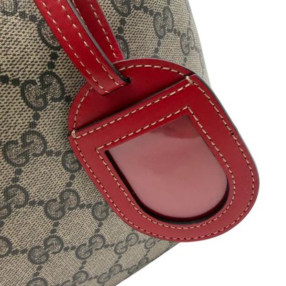 https://cdn.shopify.com/s/files/1/0564/9376/8855/files/Gucci_Shopper_Reversible_Tote_GG_Supreme_monogram_beige_11.webp?v=1781713704