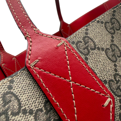https://cdn.shopify.com/s/files/1/0564/9376/8855/files/Gucci_Shopper_Reversible_Tote_GG_Supreme_monogram_beige_12.webp?v=1781713705