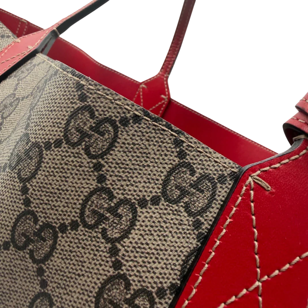 https://cdn.shopify.com/s/files/1/0564/9376/8855/files/Gucci_Shopper_Reversible_Tote_GG_Supreme_monogram_beige_13.webp?v=1781713704