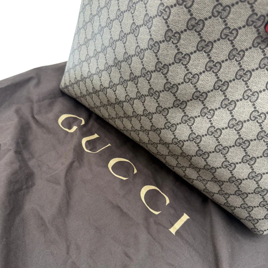 https://cdn.shopify.com/s/files/1/0564/9376/8855/files/Gucci_Shopper_Reversible_Tote_GG_Supreme_monogram_beige_18.webp?v=1781713704
