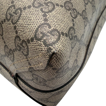 https://cdn.shopify.com/s/files/1/0564/9376/8855/files/Gucci_Shopper_Reversible_Tote_GG_Supreme_monogram_beige_6.webp?v=1781713704