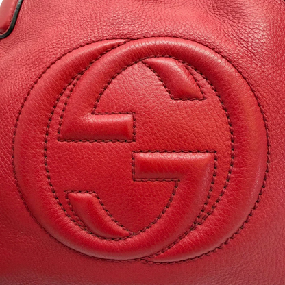 https://cdn.shopify.com/s/files/1/0564/9376/8855/files/Gucci_Shopper_Soho_Small_Leder_Rot_Interlocking_G_Umhaengegurt_Tassel_Luxury_Bag_Red_Vintage_Designer_Handtasche_Gucci_Soho_Rot_Small_Crossbody2732.webp?v=1773398547