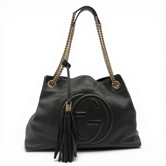 https://cdn.shopify.com/s/files/1/0564/9376/8855/files/Gucci_Shopper_Soho_mit_Umhangekette_Leder_schwarz_vintage_GG4357.webp?v=1775655504