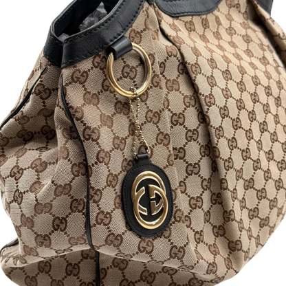 https://cdn.shopify.com/s/files/1/0564/9376/8855/files/Gucci_Shopper_Sukey_Large_monogram_beige_14_f42434ac-0c3f-4978-b6f9-374dcab1ee6a.webp?v=1784823618