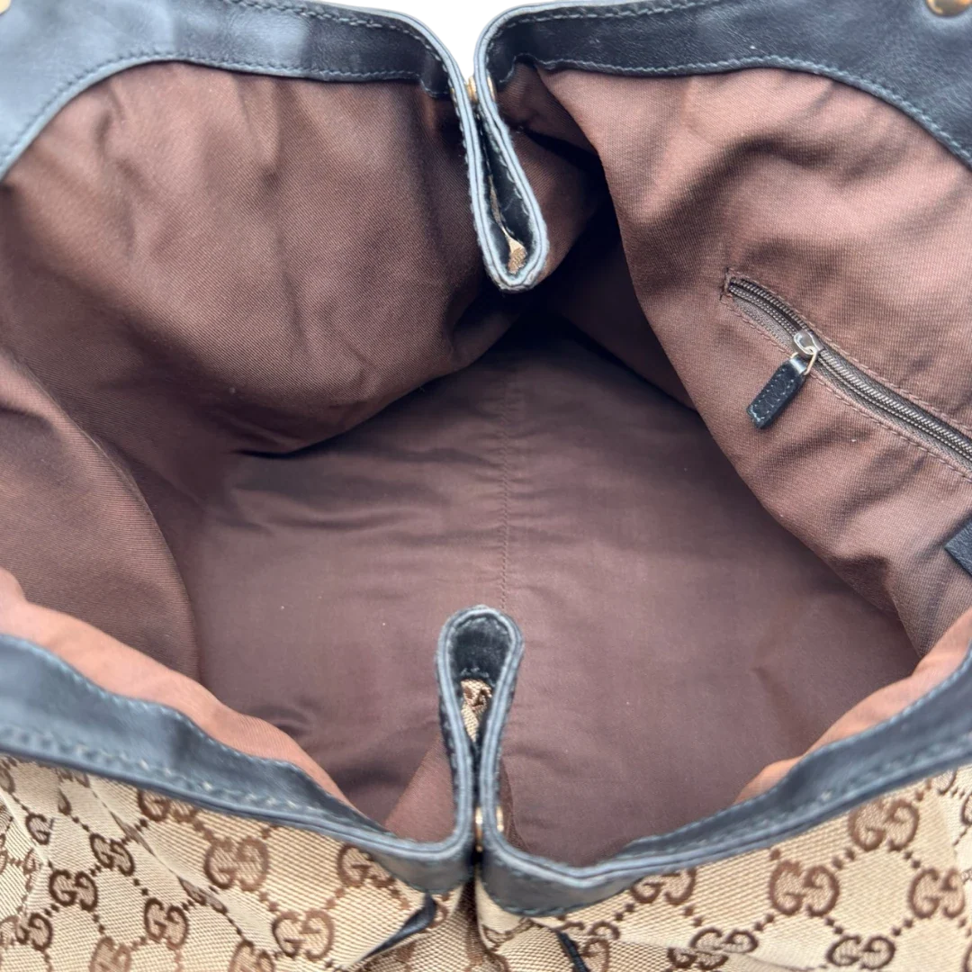 https://cdn.shopify.com/s/files/1/0564/9376/8855/files/Gucci_Shopper_Sukey_Large_monogram_beige_19_e74dd4c0-4c2b-4644-aaed-ae6ab38939be.webp?v=1784823617