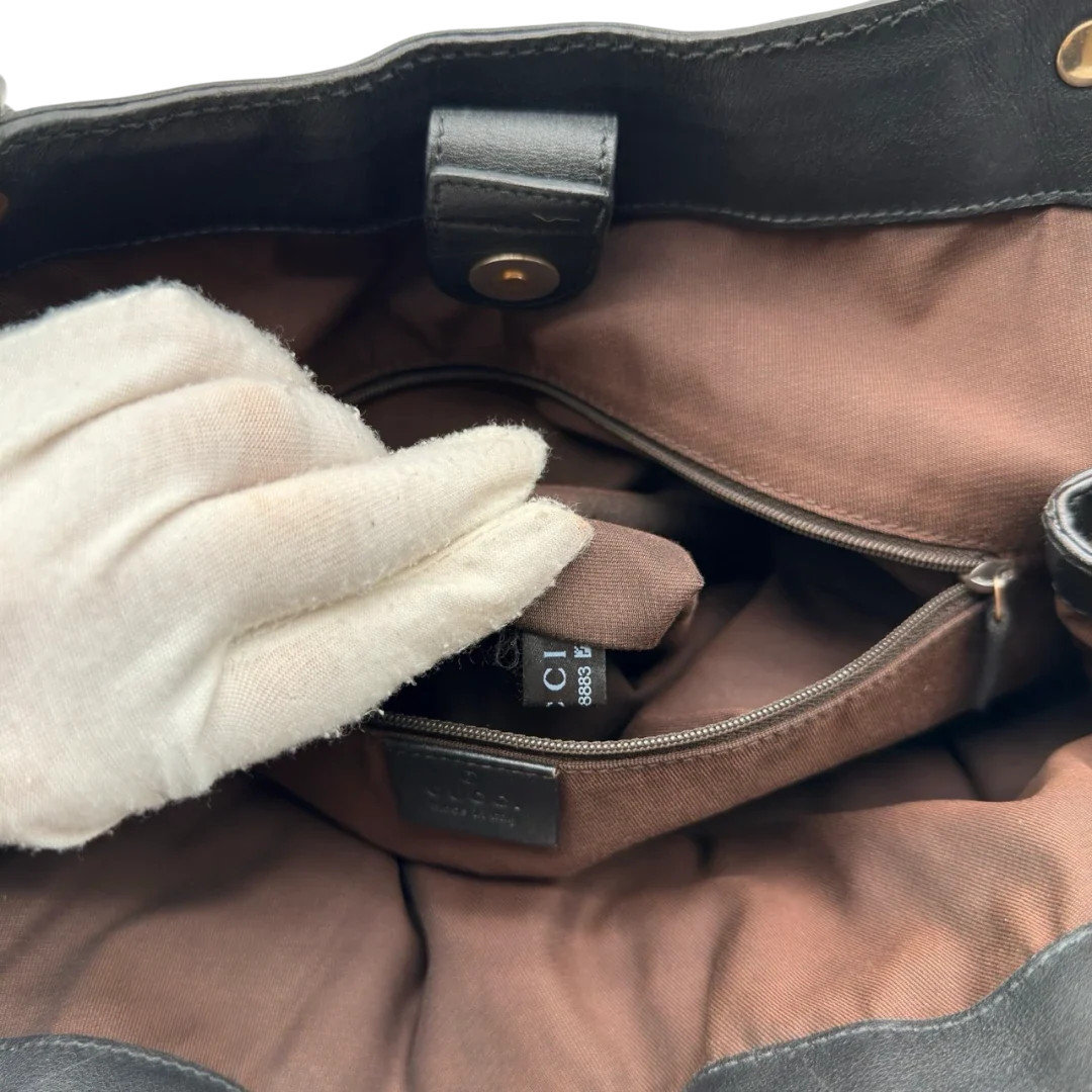 https://cdn.shopify.com/s/files/1/0564/9376/8855/files/Gucci_Shopper_Sukey_Large_monogram_beige_24_6c89594e-aa94-492d-87ae-697aab326515.webp?v=1784823617