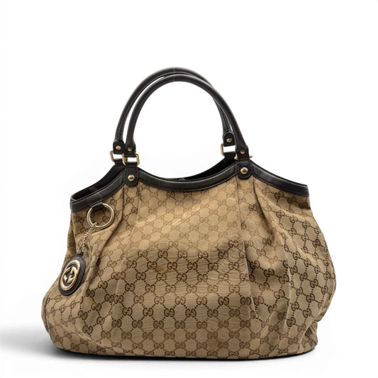 https://cdn.shopify.com/s/files/1/0564/9376/8855/files/Gucci_Shopper_Sukey_Large_monogram_beige_4_abc21094-86f6-4bf1-af59-0b4df5aefea6.webp?v=1784801705