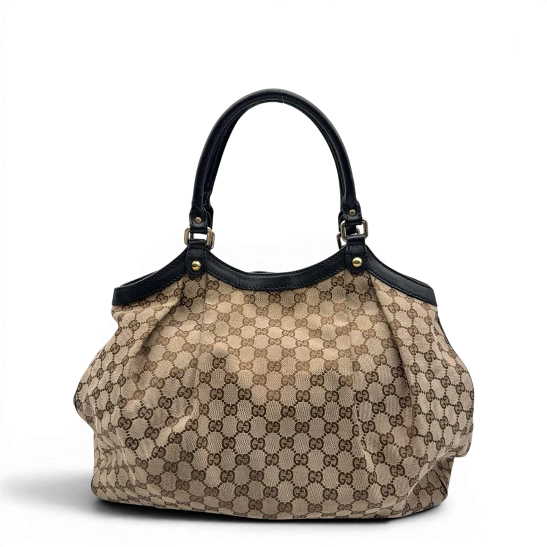 https://cdn.shopify.com/s/files/1/0564/9376/8855/files/Gucci_Shopper_Sukey_Large_monogram_beige_4_abef9c50-1a66-4760-bf58-52835f7aa951.webp?v=1784823618
