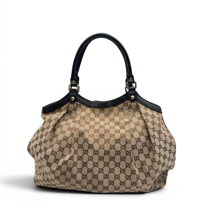 https://cdn.shopify.com/s/files/1/0564/9376/8855/files/Gucci_Shopper_Sukey_Large_monogram_beige_4_abef9c50-1a66-4760-bf58-52835f7aa951.webp?v=1784823618
