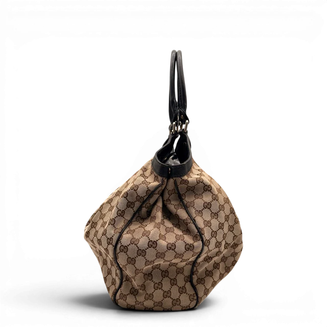 https://cdn.shopify.com/s/files/1/0564/9376/8855/files/Gucci_Shopper_Sukey_Large_monogram_beige_6_a504bc45-7bc4-4418-94bd-5f28fa80db46.webp?v=1784823617