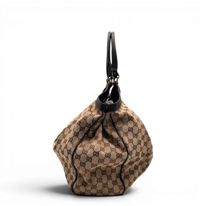 https://cdn.shopify.com/s/files/1/0564/9376/8855/files/Gucci_Shopper_Sukey_Large_monogram_beige_6_a504bc45-7bc4-4418-94bd-5f28fa80db46.webp?v=1784823617