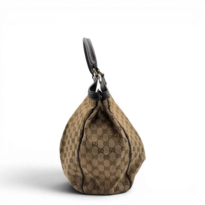 https://cdn.shopify.com/s/files/1/0564/9376/8855/files/Gucci_Shopper_Sukey_Large_monogram_beige_7_318a56a2-8086-4683-bb4b-c0f7365b1da0.webp?v=1784801705