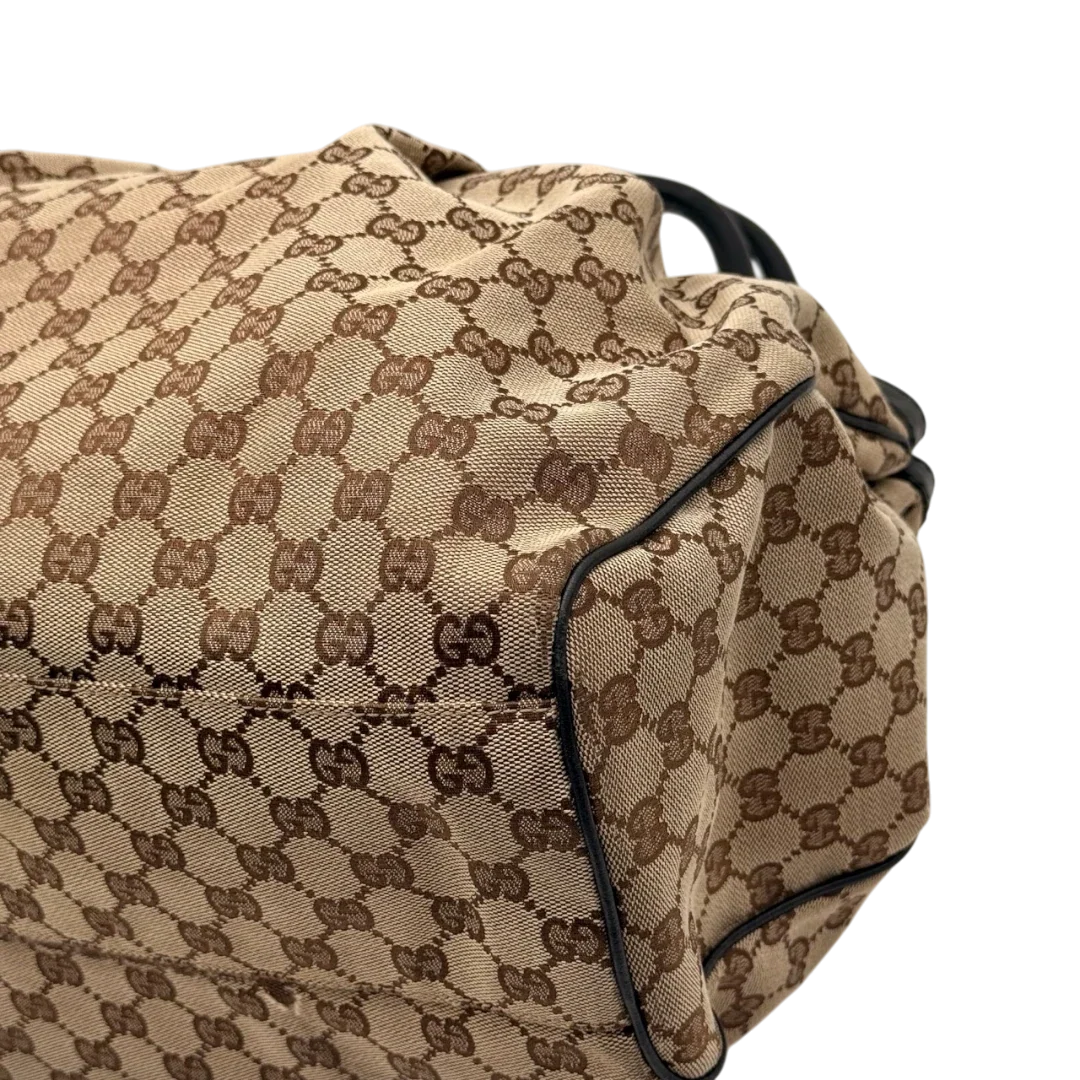 https://cdn.shopify.com/s/files/1/0564/9376/8855/files/Gucci_Shopper_Sukey_Large_monogram_beige_9_89931916-6412-4cb6-a6af-13a9cfc17e5f.webp?v=1784823617