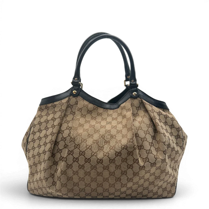 https://cdn.shopify.com/s/files/1/0564/9376/8855/files/Gucci_Shopper_Sukey_Large_monogram_beige_vintage_GG6132.webp?v=1778082641