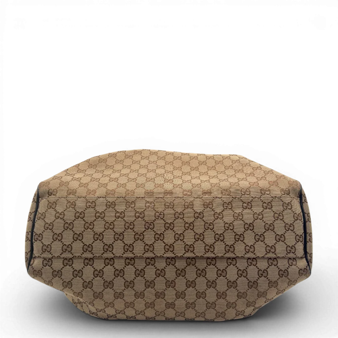 https://cdn.shopify.com/s/files/1/0564/9376/8855/files/Gucci_Shopper_Sukey_Large_monogram_beige_vintage_GG6135.webp?v=1778082641