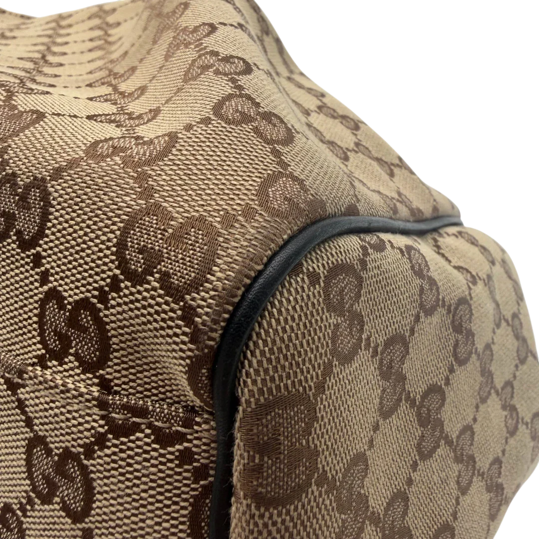 https://cdn.shopify.com/s/files/1/0564/9376/8855/files/Gucci_Shopper_Sukey_Large_monogram_beige_vintage_GG6142.webp?v=1778082641
