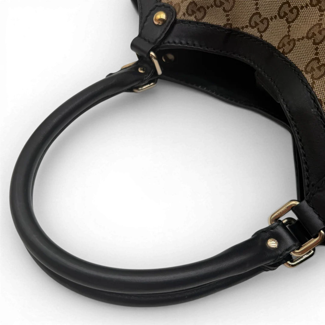 https://cdn.shopify.com/s/files/1/0564/9376/8855/files/Gucci_Shopper_Sukey_Large_monogram_beige_vintage_GG6145.webp?v=1778082641