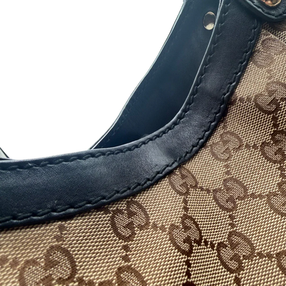 https://cdn.shopify.com/s/files/1/0564/9376/8855/files/Gucci_Shopper_Sukey_Large_monogram_beige_vintage_GG6148.webp?v=1778082642