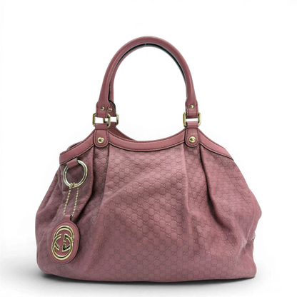 https://cdn.shopify.com/s/files/1/0564/9376/8855/files/Gucci_Shopper_Sukey_aus_Leder_monogram_rosa_vintage_GG5939.webp?v=1778066999