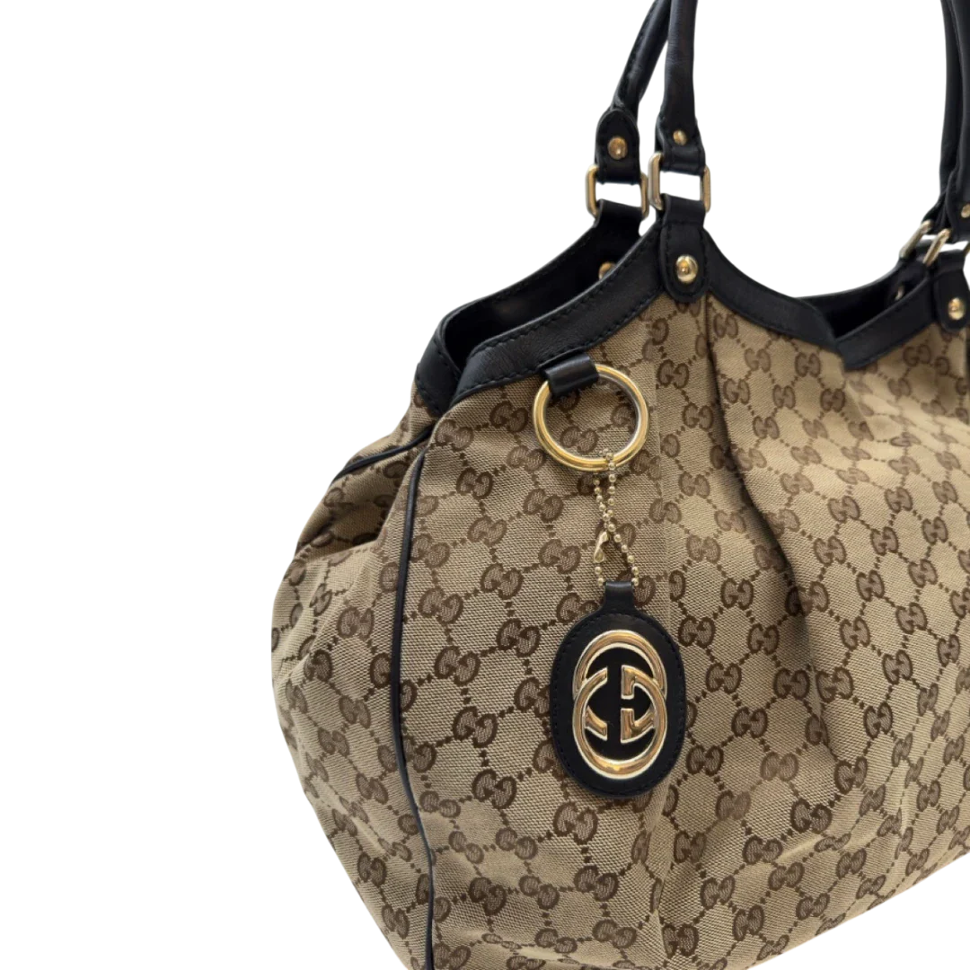 https://cdn.shopify.com/s/files/1/0564/9376/8855/files/Gucci_Shopper_Sukey_large_monogram_beige_12_9962cd63-e3fc-4462-812c-03ee3bf9f8f1.webp?v=1783515047