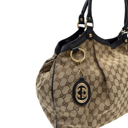 https://cdn.shopify.com/s/files/1/0564/9376/8855/files/Gucci_Shopper_Sukey_large_monogram_beige_12_9962cd63-e3fc-4462-812c-03ee3bf9f8f1.webp?v=1783515047
