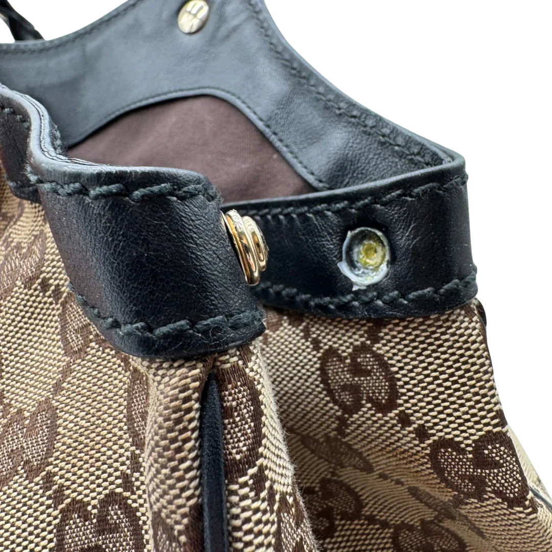 https://cdn.shopify.com/s/files/1/0564/9376/8855/files/Gucci_Shopper_Sukey_large_monogram_beige_13.webp?v=1781106235