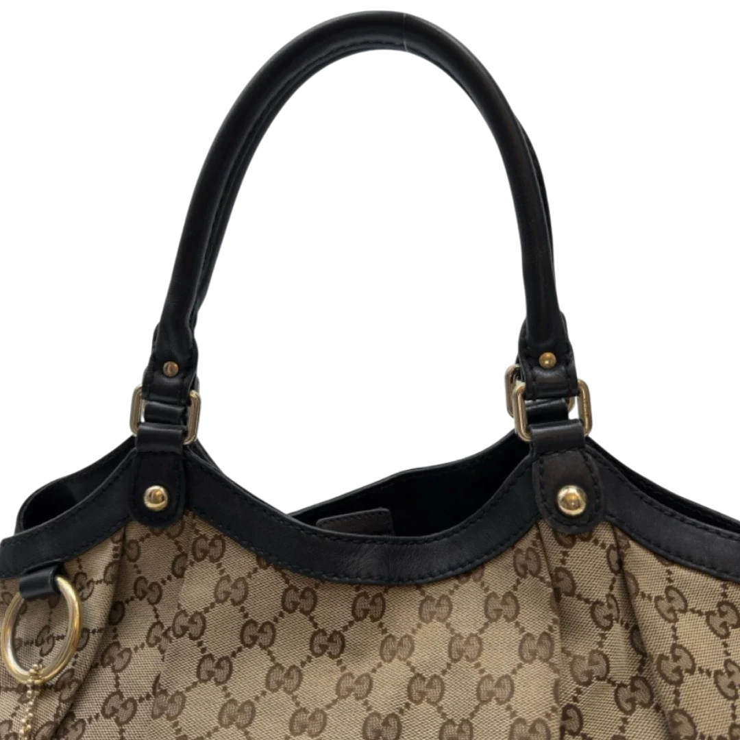 https://cdn.shopify.com/s/files/1/0564/9376/8855/files/Gucci_Shopper_Sukey_large_monogram_beige_13_33fcebd1-5032-486f-842e-e548aa0e189d.webp?v=1783515047
