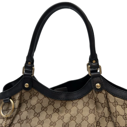 https://cdn.shopify.com/s/files/1/0564/9376/8855/files/Gucci_Shopper_Sukey_large_monogram_beige_13_33fcebd1-5032-486f-842e-e548aa0e189d.webp?v=1783515047