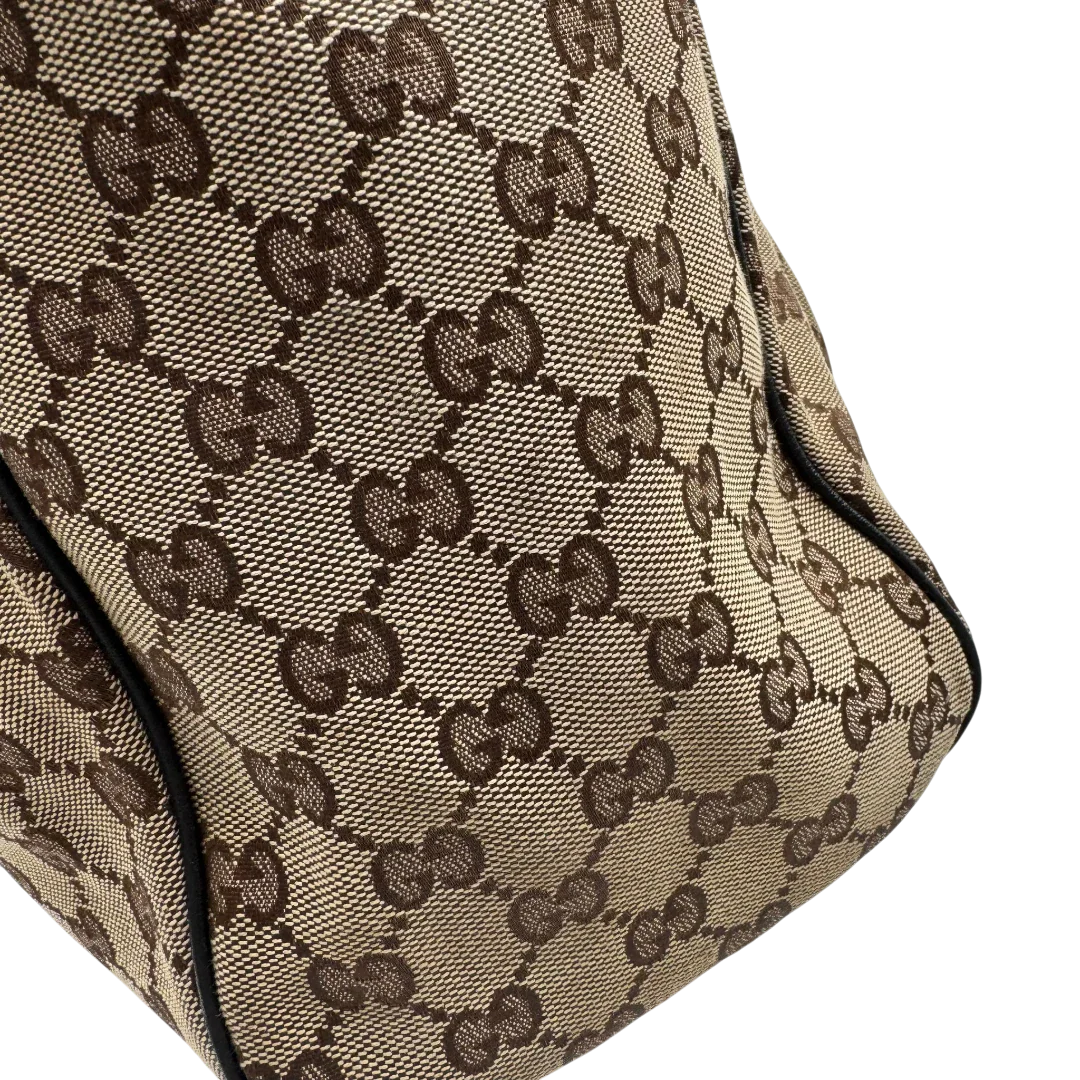 https://cdn.shopify.com/s/files/1/0564/9376/8855/files/Gucci_Shopper_Sukey_large_monogram_beige_14.webp?v=1781106235