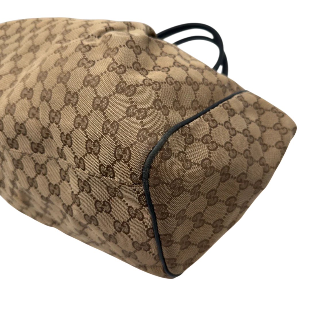 https://cdn.shopify.com/s/files/1/0564/9376/8855/files/Gucci_Shopper_Sukey_large_monogram_beige_14_70936f77-fd5d-44a9-907a-330964d316c2.webp?v=1784240823