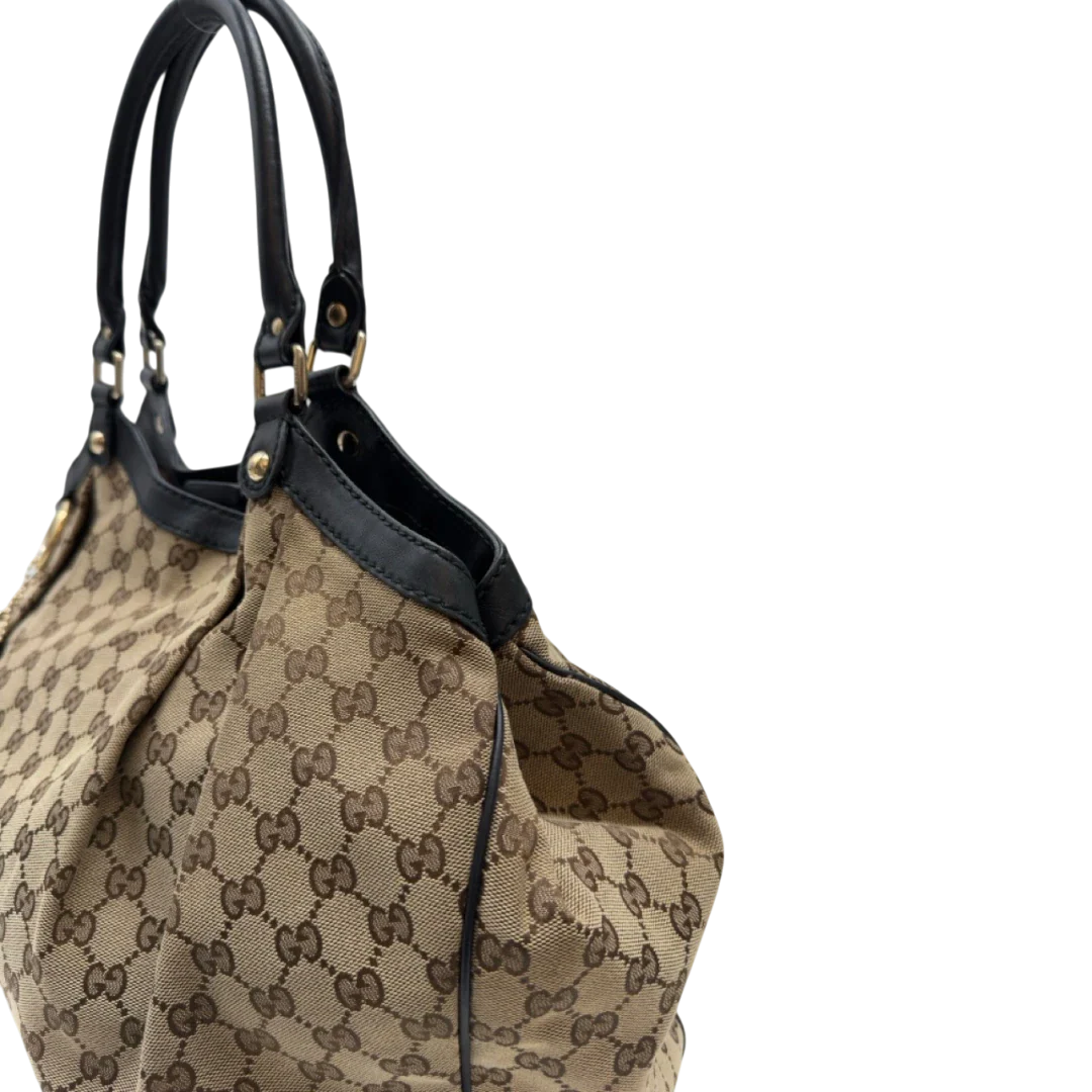 https://cdn.shopify.com/s/files/1/0564/9376/8855/files/Gucci_Shopper_Sukey_large_monogram_beige_14_a4483512-cb74-401f-9577-819e1c205f54.webp?v=1783515047