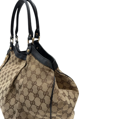https://cdn.shopify.com/s/files/1/0564/9376/8855/files/Gucci_Shopper_Sukey_large_monogram_beige_14_a4483512-cb74-401f-9577-819e1c205f54.webp?v=1783515047