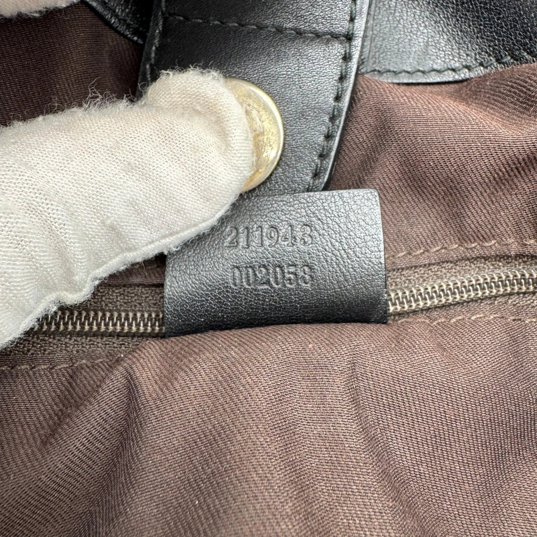 https://cdn.shopify.com/s/files/1/0564/9376/8855/files/Gucci_Shopper_Sukey_large_monogram_beige_18.webp?v=1781106235