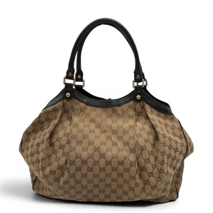 https://cdn.shopify.com/s/files/1/0564/9376/8855/files/Gucci_Shopper_Sukey_large_monogram_beige_1_e68f8f58-7400-4b05-9583-c5cb1886954b.webp?v=1784240823