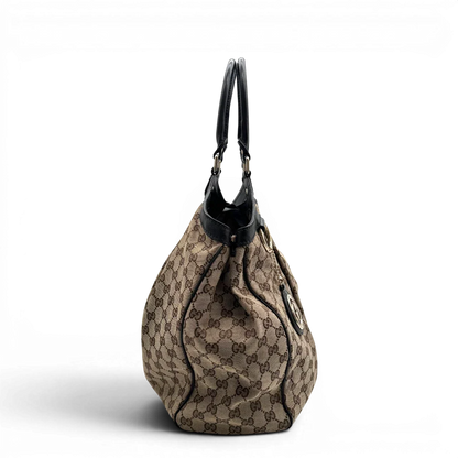 https://cdn.shopify.com/s/files/1/0564/9376/8855/files/Gucci_Shopper_Sukey_large_monogram_beige_2.webp?v=1781106234