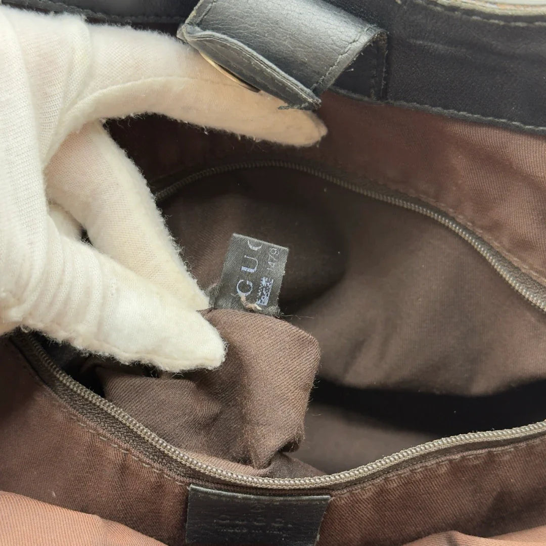 https://cdn.shopify.com/s/files/1/0564/9376/8855/files/Gucci_Shopper_Sukey_large_monogram_beige_21_529ca0f2-2f4c-430c-86b8-8f09abad3ae4.webp?v=1784240823