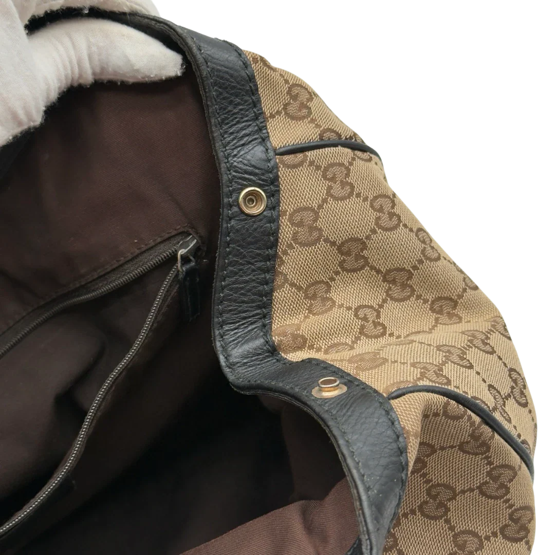 https://cdn.shopify.com/s/files/1/0564/9376/8855/files/Gucci_Shopper_Sukey_large_monogram_beige_23.webp?v=1784240823