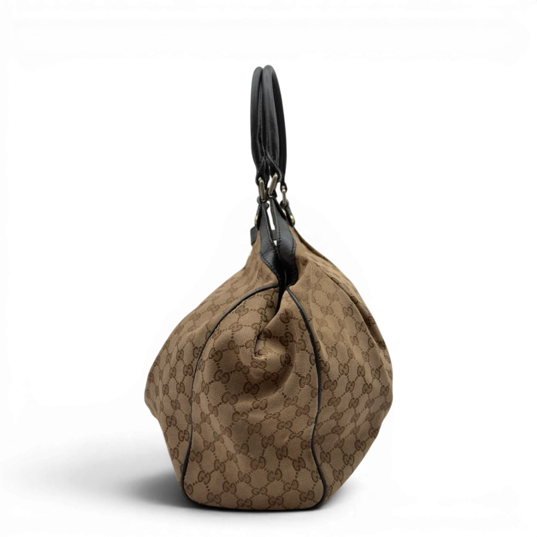 https://cdn.shopify.com/s/files/1/0564/9376/8855/files/Gucci_Shopper_Sukey_large_monogram_beige_3_8de755c4-9b93-4a13-af80-b6597a7d26f2.webp?v=1784240823