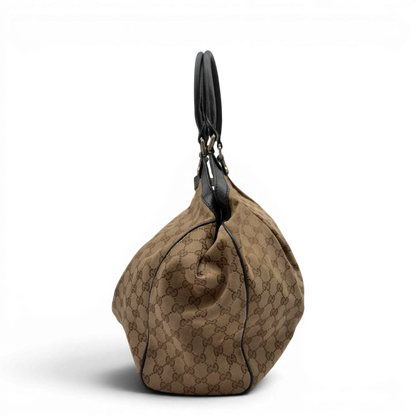 https://cdn.shopify.com/s/files/1/0564/9376/8855/files/Gucci_Shopper_Sukey_large_monogram_beige_3_8de755c4-9b93-4a13-af80-b6597a7d26f2.webp?v=1784240823