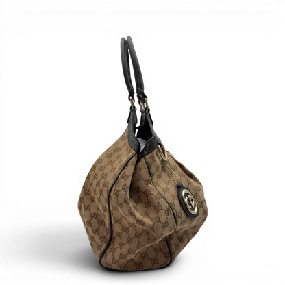 https://cdn.shopify.com/s/files/1/0564/9376/8855/files/Gucci_Shopper_Sukey_large_monogram_beige_4_9c204c3f-52d6-4460-a440-77b856c60b07.webp?v=1784240822