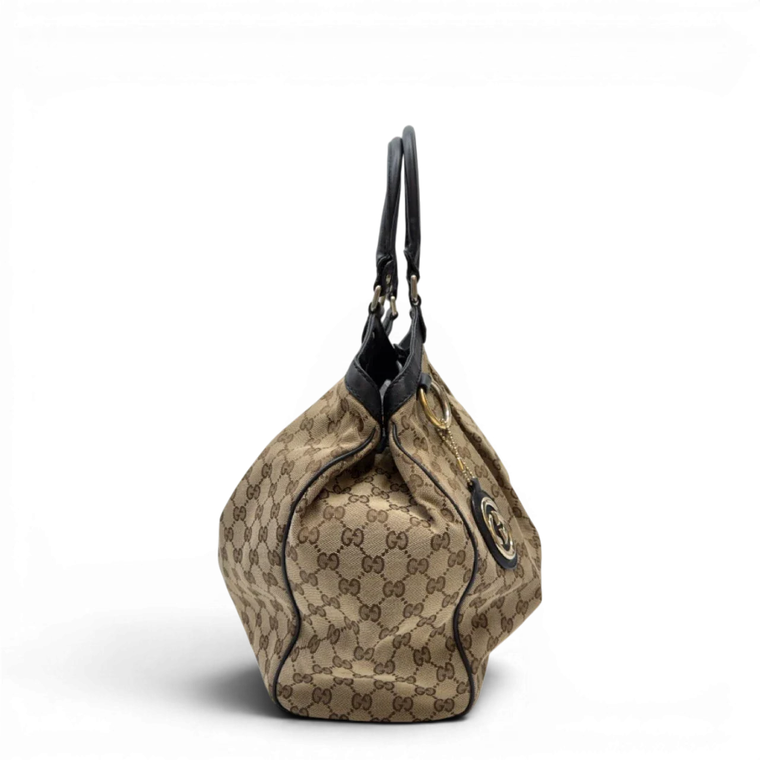 https://cdn.shopify.com/s/files/1/0564/9376/8855/files/Gucci_Shopper_Sukey_large_monogram_beige_5_c000de49-b187-49cd-b25d-1cbdfd3101cc.webp?v=1783515047