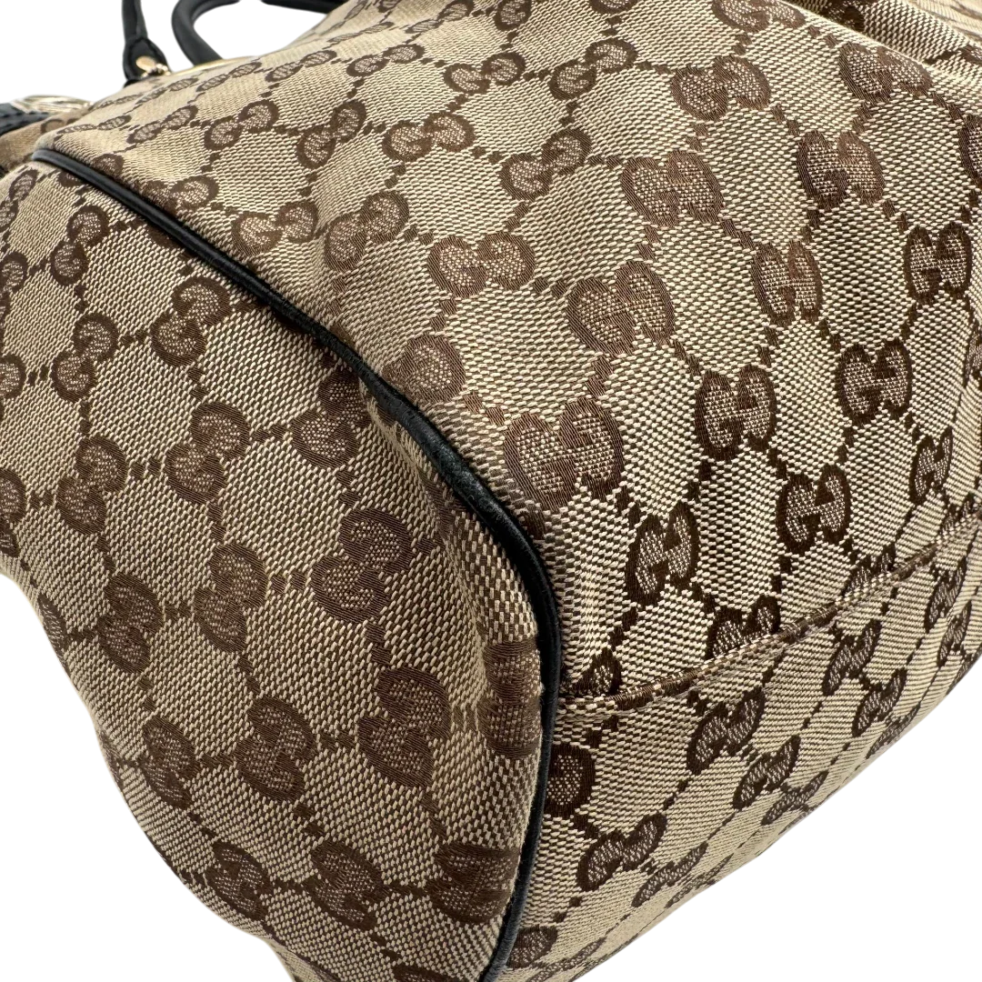 https://cdn.shopify.com/s/files/1/0564/9376/8855/files/Gucci_Shopper_Sukey_large_monogram_beige_6.webp?v=1781106235