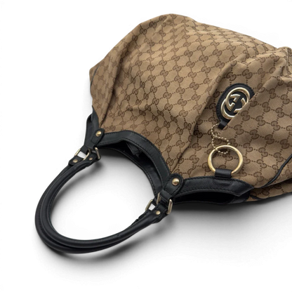 https://cdn.shopify.com/s/files/1/0564/9376/8855/files/Gucci_Shopper_Sukey_large_monogram_beige_6_b4e945e9-1356-4ea8-97a8-cba381eade16.webp?v=1784240823